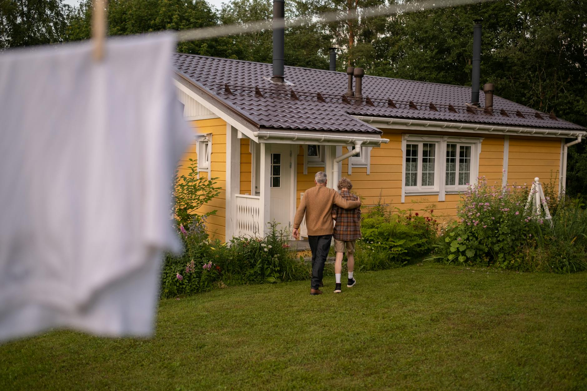 grandfather and grandson walking home
